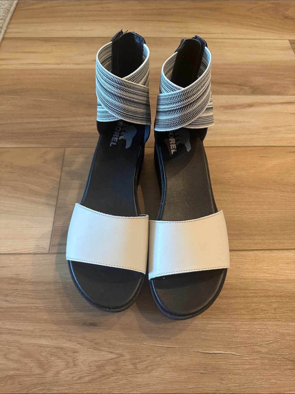 Sorel Two-Tone Elastic Ankle Strap Sandal in Cream and Black